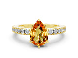 Yellow gold Pear Cut Solitaire Diamond with Pavé Band and Four-Prong Setting