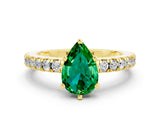Yellow gold Pear Cut Solitaire Diamond with Pavé Band and Four-Prong Setting