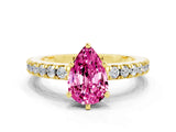 Yellow gold Pear Cut Solitaire Diamond with Pavé Band and Four-Prong Setting