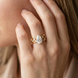 Yellow gold Pear Cut Solitaire Diamond with Side Stones on Criss-Cross Band and Four-Prong Setting_15