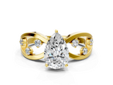Yellow gold Pear Cut Solitaire Diamond with Side Stones on Criss-Cross Band and Four-Prong Setting_25