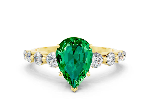 Yellow gold Pear Cut Solitaire Emerald Ring with Pave Band and Four-Prong Setting