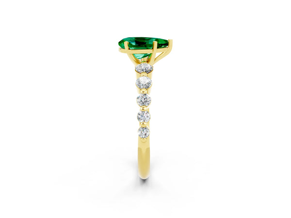 Yellow gold Pear Cut Solitaire Emerald Ring with Pave Band and Four-Prong Setting