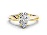Yellow gold Pear Cut Solitaire Engagement Ring with Tapered Band and Four-Prong Setting