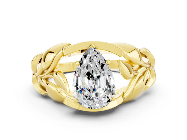 Yellow gold Pear Cut Moissanite Leaf-Inspired Engagement Ring with Round Accents and Prong Setting