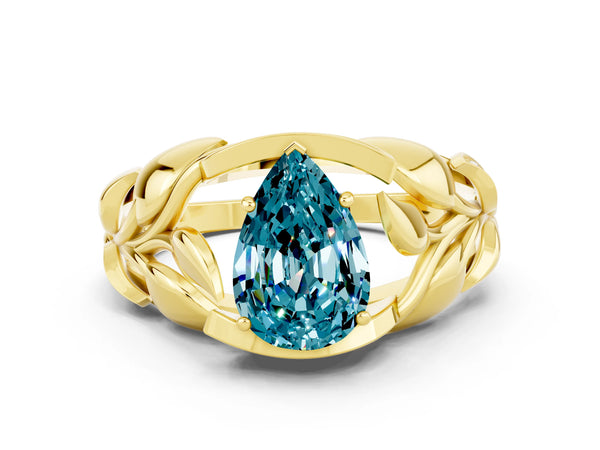 Yellow gold Pear Cut Solitaire Leaf-Inspired Engagement Ring with Prong Setting