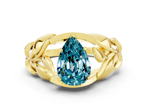 Yellow gold Pear Cut Solitaire Leaf-Inspired Engagement Ring with Prong Setting