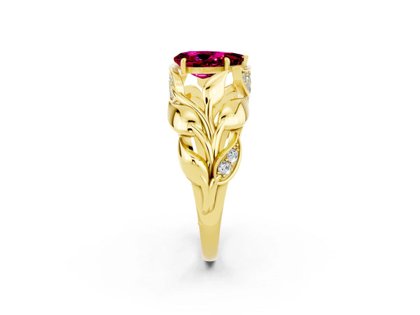 Yellow gold Pear Cut Garnet Leaf-Inspired Engagement Ring with Round Accents and Prong Setting