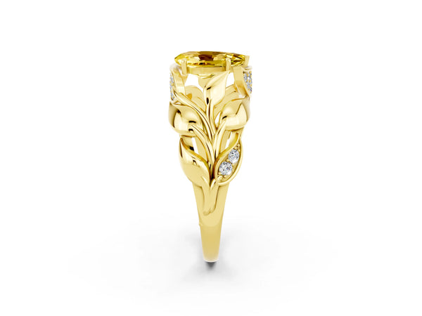 Yellow gold Pear Cut Yellow Sapphire Leaf-Inspired Engagement Ring with Round Accents and Prong Setting