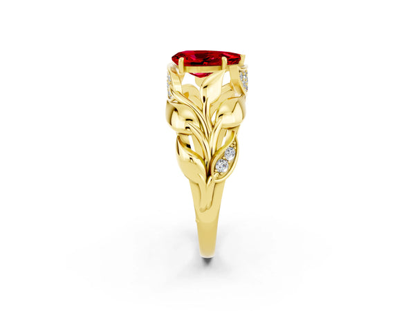 Yellow gold Pear Cut Ruby Leaf-Inspired Engagement Ring with Round Accents and Prong Setting