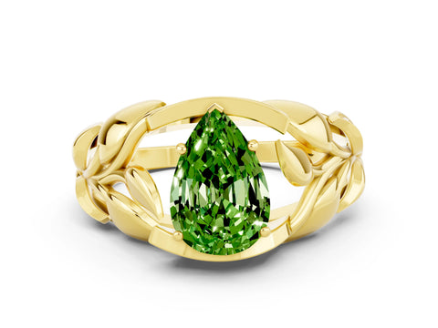 Yellow gold Pear Cut Solitaire Leaf-Inspired Engagement Ring with Prong Setting