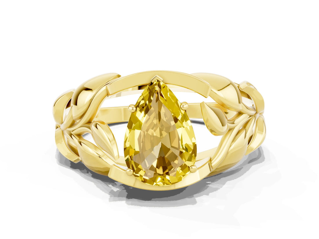 Yellow gold Pear Cut Solitaire Leaf-Inspired Engagement Ring with Prong Setting