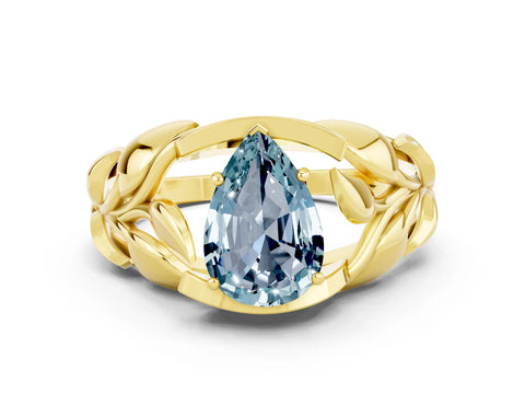 Yellow gold Pear Cut Solitaire Leaf-Inspired Engagement Ring with Prong Setting