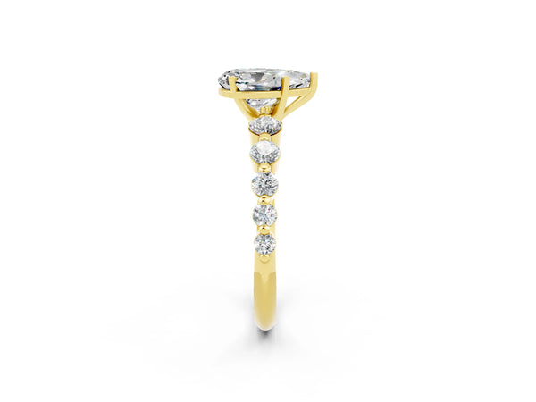 Yellow gold Pear Cut Solitaire Moissanite Ring with Pave Band and Four-Prong Setting