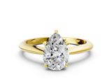 Yellow gold Pear Cut Solitaire Ring with Four-Prong Setting on a Classic Band_54