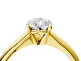 Yellow gold Pear Cut Solitaire Ring with Four-Prong Setting on a Classic Band_58