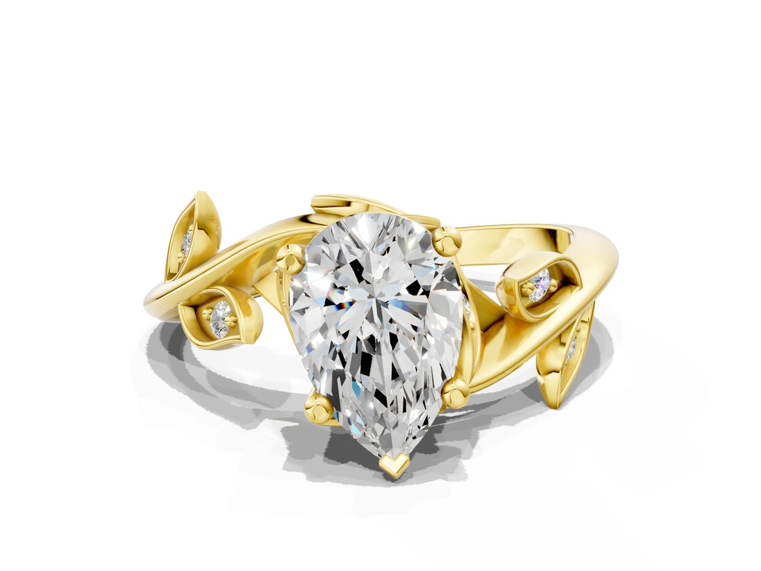 Yellow gold Pear Cut Solitaire Twist Engagement Ring with Leaf Accents and Prong Setting_15