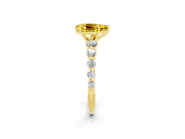 Yellow gold Pear Cut Solitaire Yellow Sapphire Ring with Pave Band and Four-Prong Setting