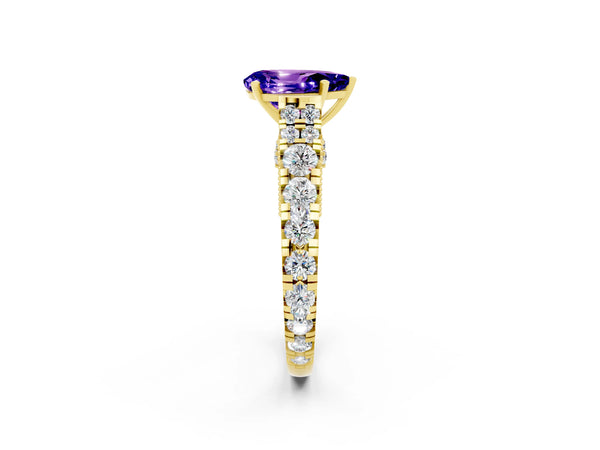 Yellow gold Pear Cut Tanzanite Classic Solitaire Ring with Pavé Band and Four-Prong Setting
