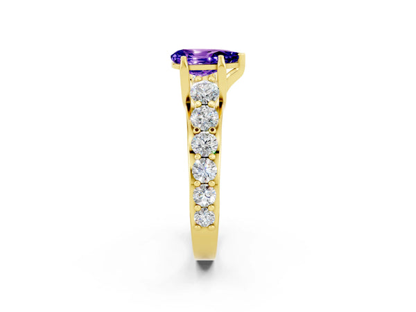 Yellow gold Pear Cut Tanzanite Engagement Ring with Pavé Band and Four-Prong Setting