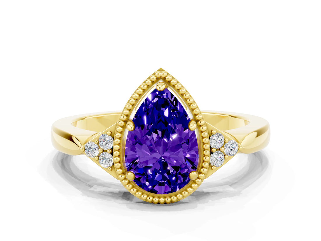 Yellow gold Pear Cut Tanzanite Halo Ring with Tapered Band and Four-Prong Setting