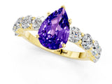 Yellow gold Pear Cut Tanzanite Prong Setting with Side Stones on a Pave Band_1