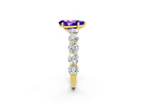 Yellow gold Pear Cut Tanzanite Prong Setting with Side Stones on a Pave Band_2