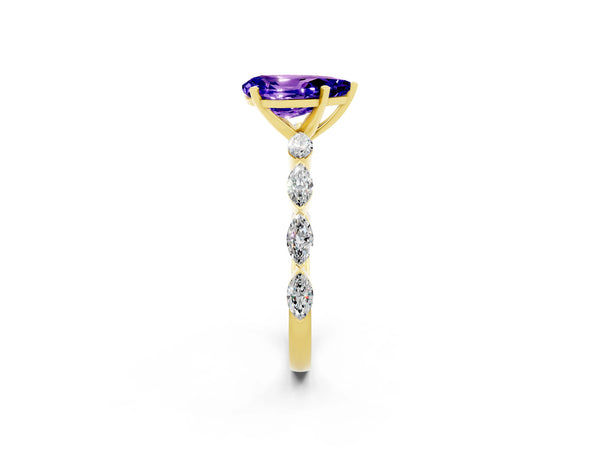 Yellow gold Pear Cut Tanzanite Ring with Marquise Side Stones and Prong Setting