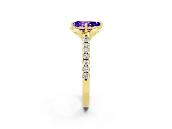 Yellow gold Pear Cut Tanzanite Ring with Pavé Band and Floral Prong Setting
