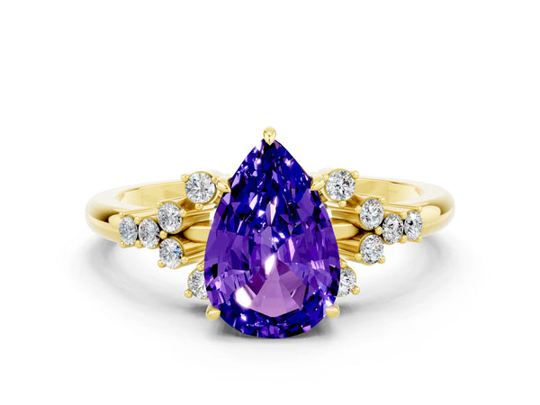 Yellow gold Pear Cut Tanzanite Ring with Side Stones and Four-Prong Setting