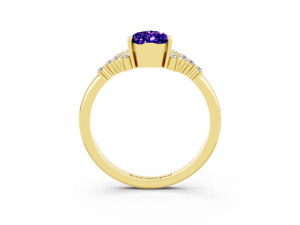 Yellow gold Pear Cut Tanzanite Ring with Side Stones and Four-Prong Setting