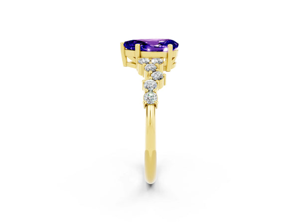 Yellow gold Pear Cut Tanzanite Scattered Round Accent Ring with Prong Setting