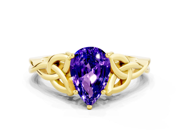 Yellow gold Pear Cut Tanzanite Solitaire Celtic Knot Ring with Four-Prong Setting