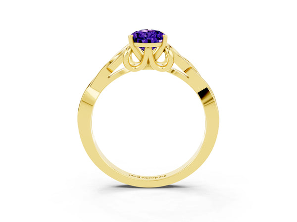Yellow gold Pear Cut Tanzanite Solitaire Celtic Knot Ring with Four-Prong Setting
