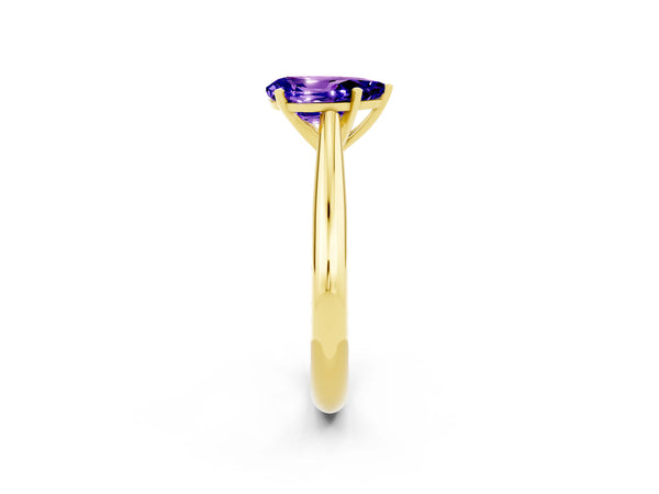 Yellow gold Pear Cut Tanzanite Solitaire Engagement Ring with Cathedral Setting and Four-Prong Mount