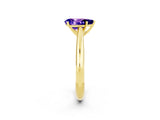 Yellow gold Pear Cut Tanzanite Solitaire Engagement Ring with Cathedral Setting and Four-Prong Mount_86
