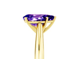 Yellow gold Pear Cut Tanzanite Solitaire Engagement Ring with Cathedral Setting and Four-Prong Mount_89