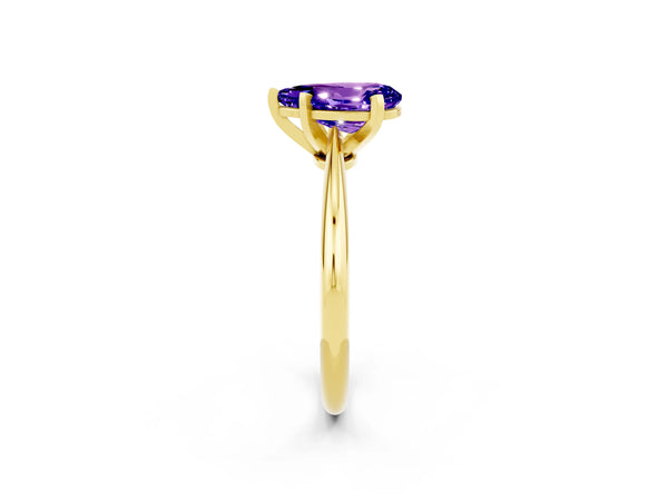 Yellow gold Pear Cut Tanzanite Solitaire Engagement Ring with Classic Band and Four-Prong Setting
