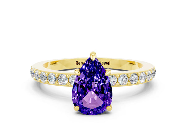 Yellow gold Pear Cut Tanzanite Solitaire Engagement Ring with Pavé Band and Four-Prong Setting