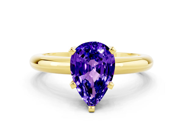 Yellow gold Pear Cut Tanzanite Solitaire Engagement Ring with Round Band and Four-Prong Setting