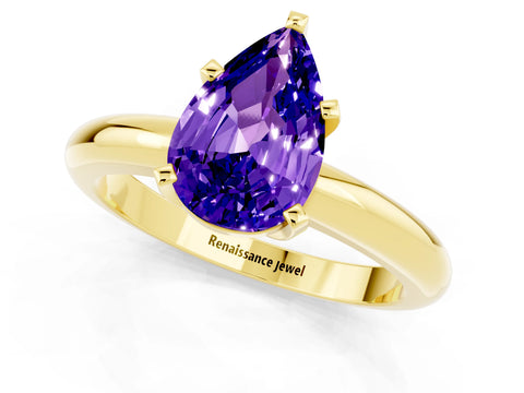 Yellow gold Pear Cut Tanzanite Solitaire Engagement Ring with Round Band and Four-Prong Setting_1