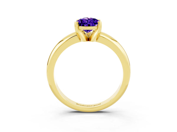 Yellow gold Pear Cut Tanzanite Solitaire Engagement Ring with Round Band and Four-Prong Setting