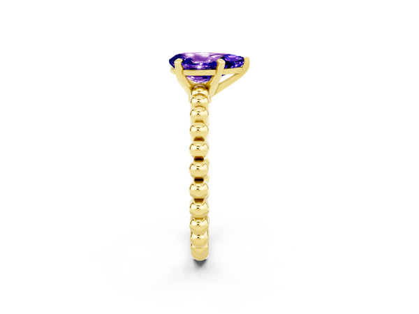 Yellow gold Pear Cut Tanzanite Solitaire Ring with Beaded Band and Prong Setting