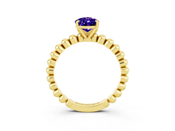 Yellow gold Pear Cut Tanzanite Solitaire Ring with Beaded Band and Prong Setting