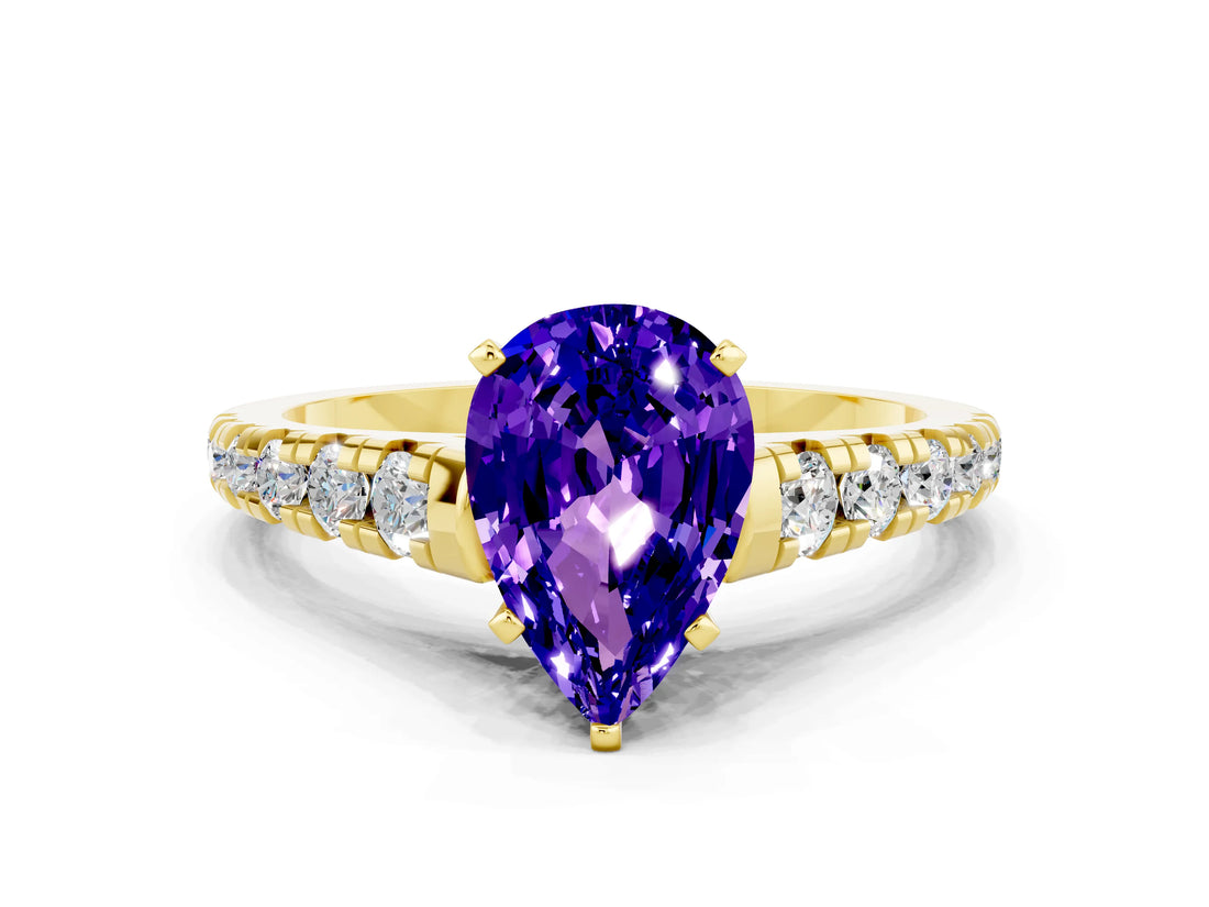 Yellow gold Pear Cut Tanzanite Solitaire Ring with Cathedral Setting and Pavé Band