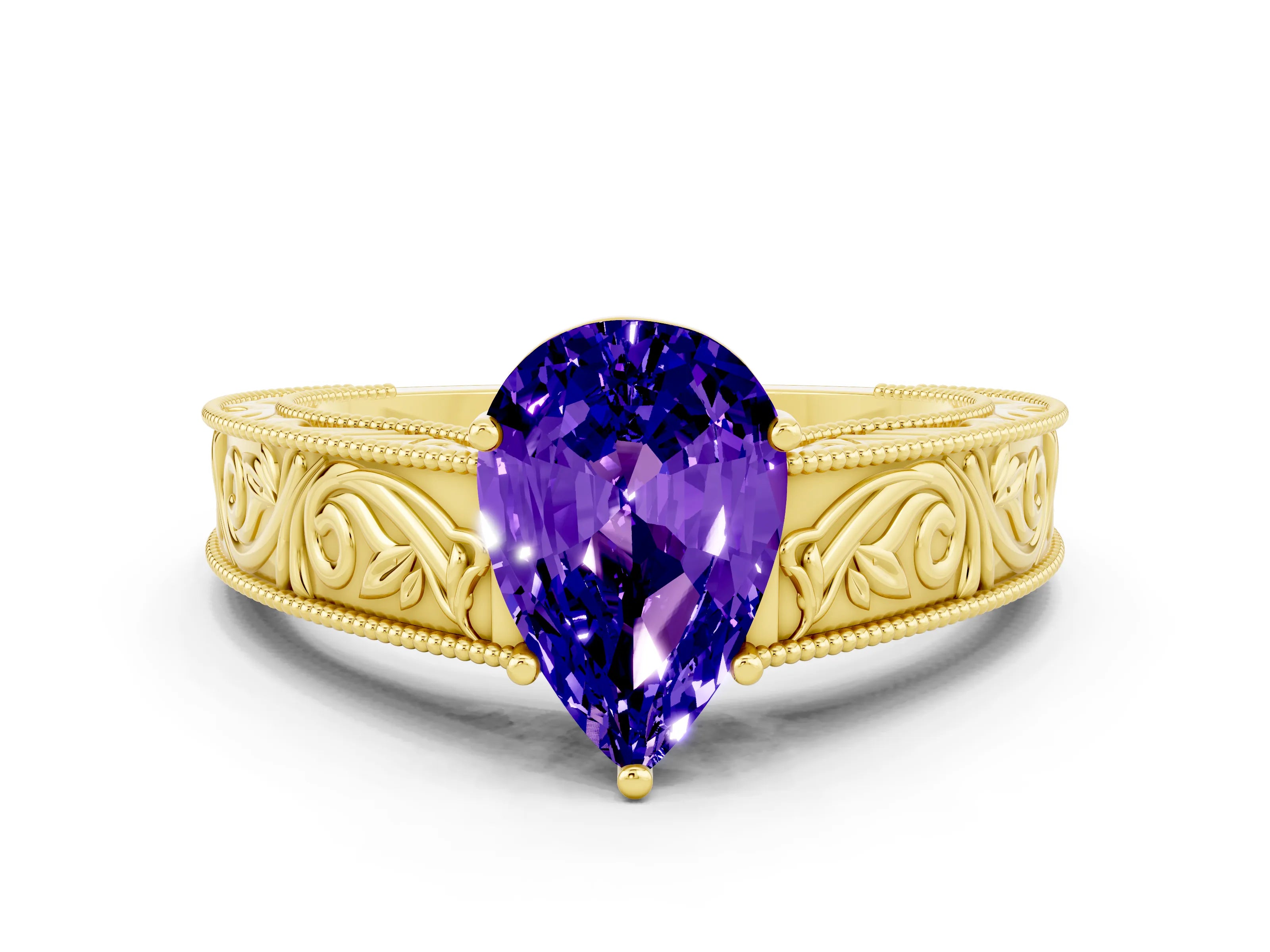 Yellow gold Pear Cut Tanzanite Solitaire Ring with Engraved Band and Four-Prong Setting
