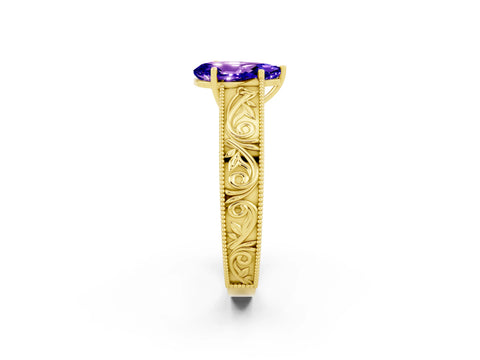 Yellow gold Pear Cut Tanzanite Solitaire Ring with Engraved Band and Four-Prong Setting_2