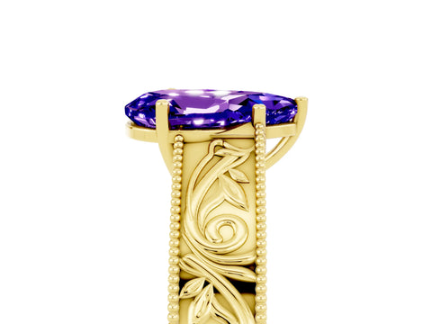 Yellow gold Pear Cut Tanzanite Solitaire Ring with Engraved Band and Four-Prong Setting_5