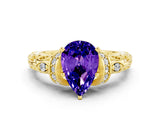 Yellow gold Pear Cut Tanzanite Solitaire Ring with Filigree Band and Four-Prong Setting_24
