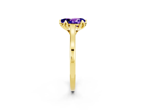 Yellow gold Pear Cut Tanzanite Solitaire Ring with Flower Prong Setting and Classic Band